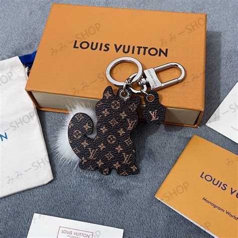 louis vuitton shiba inu keychain|louis vuitton luggage charms.